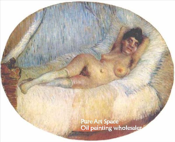 Nude woman on a bed